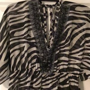 Zebra print beach cover up with black beading.